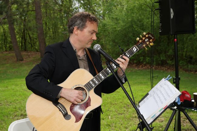 Dave Milliken performs at Saba Chez Wedding Ceremony